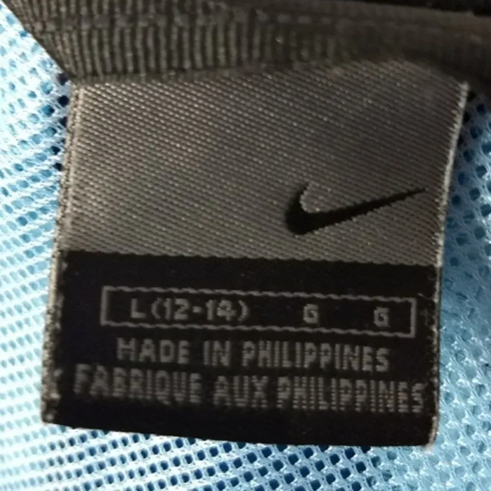 Nike blue zip up windbreaker jacket size L